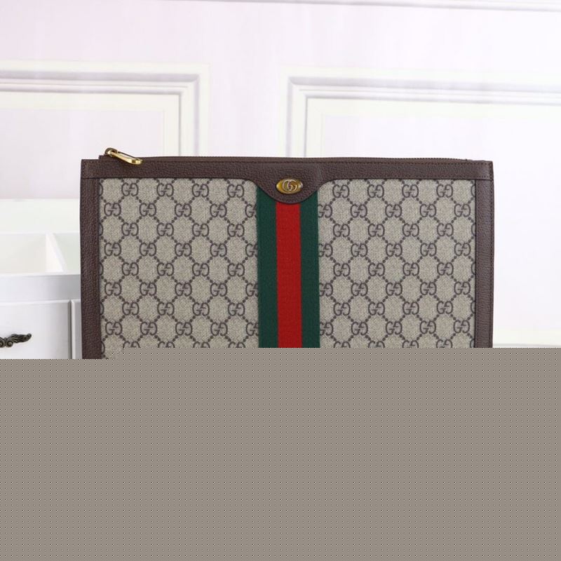 G*u*i clutch bags